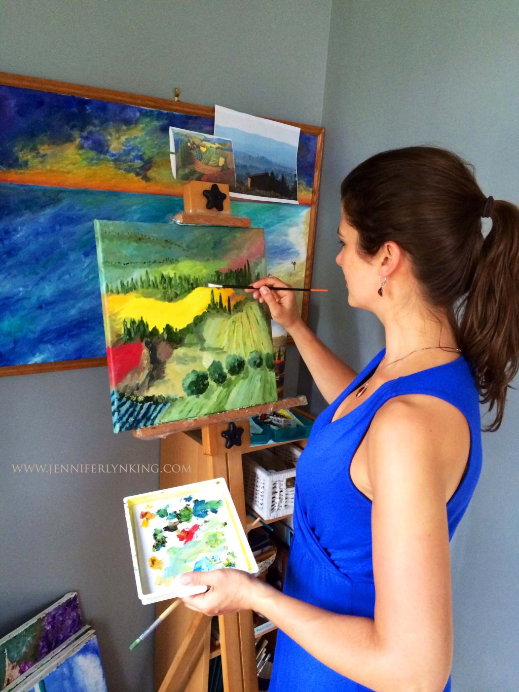 me (Jennifer Lyn King) painting one of the Siena canvases