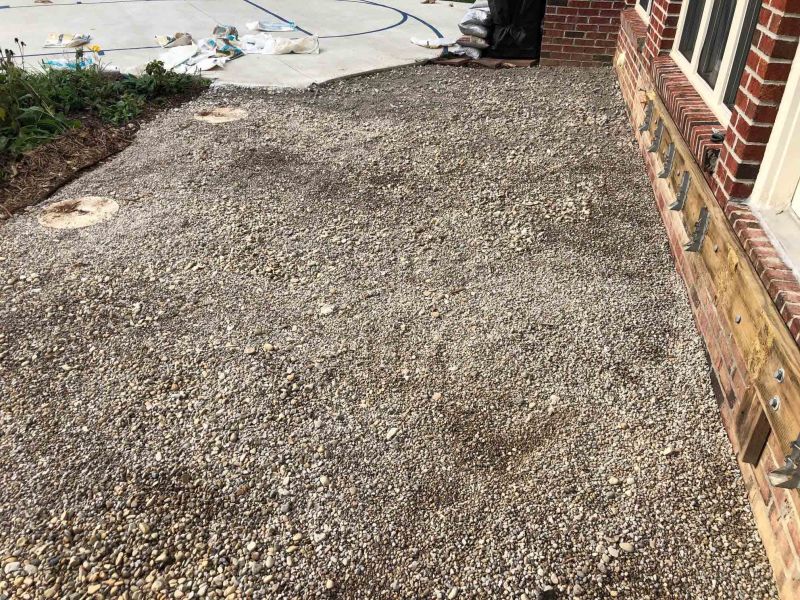 a blank slate -- the deck is torn out and preparing for pavers